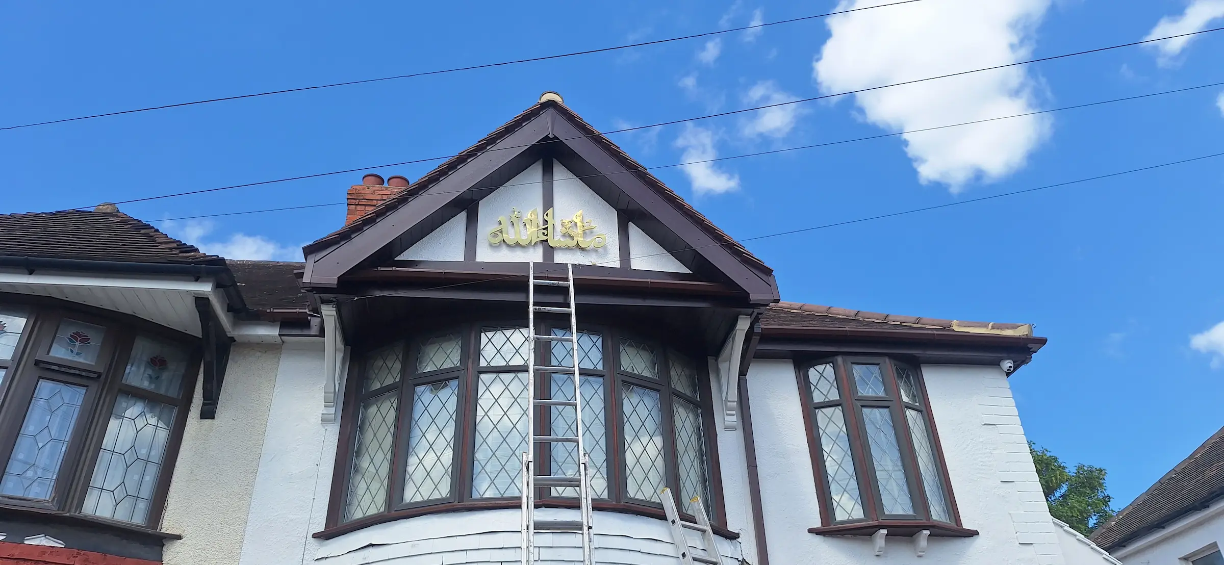 Ladder Next to House